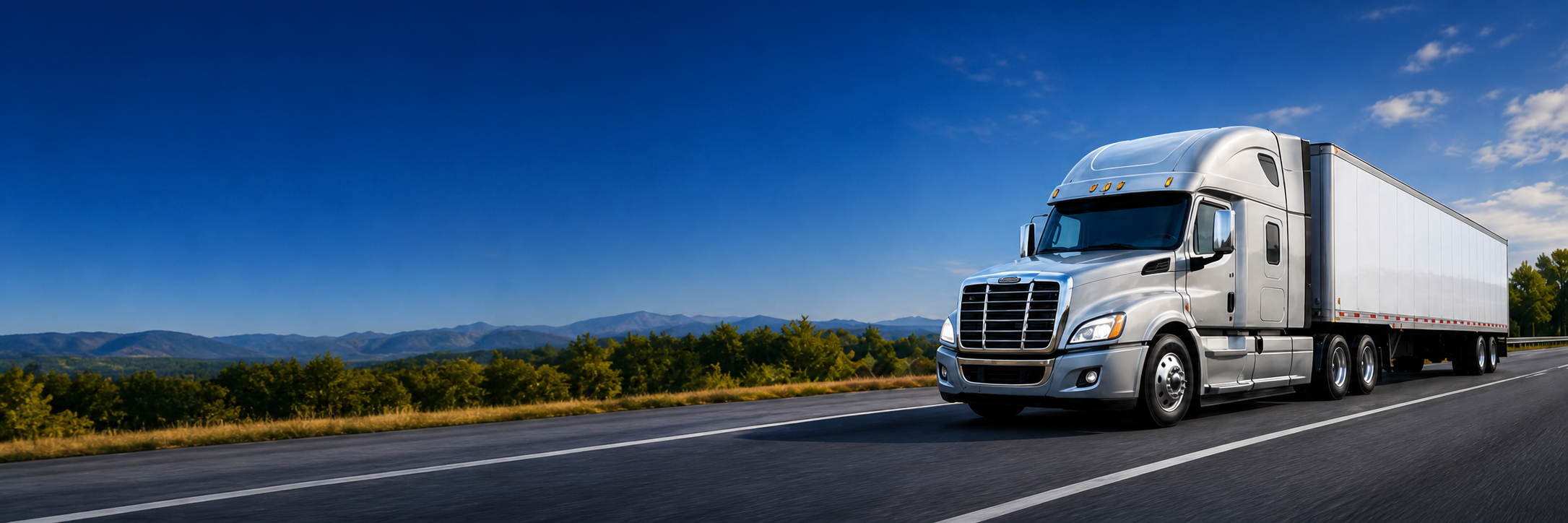 Silver truck driving on highway